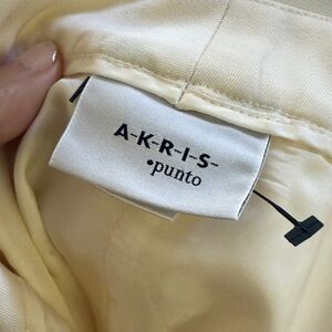 Akris Punto Ivory pants, 100 percent wool, zipper on side. Size 12